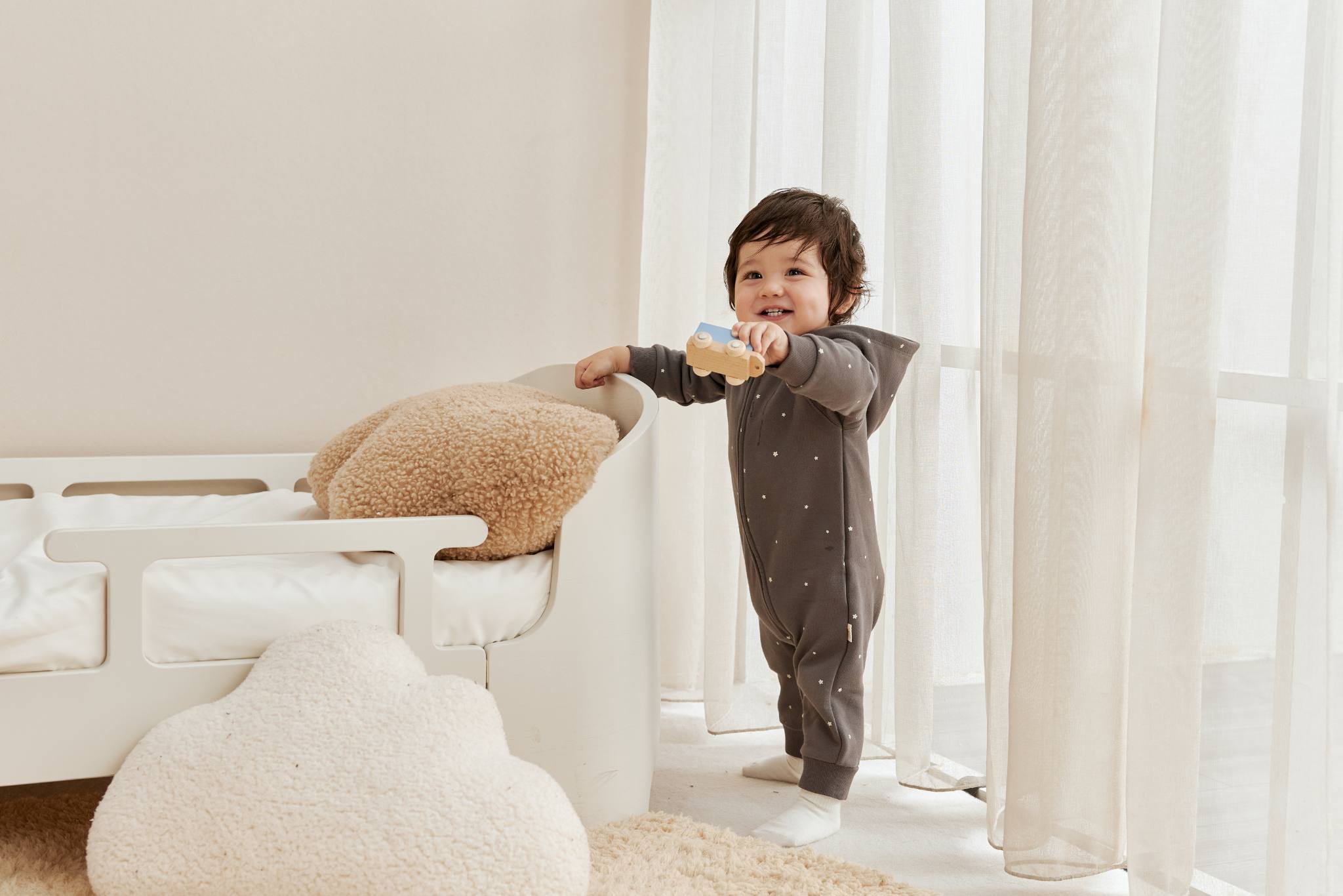 baby wearing norsu organic fleece bodysuit