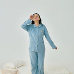 women standing in front of bed and wearing Women Organic Long-sleeve PJ Set-Citadel