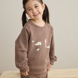 baby smiling and wearing Toddler Organic Fleece Sweatshirt-Fantasy