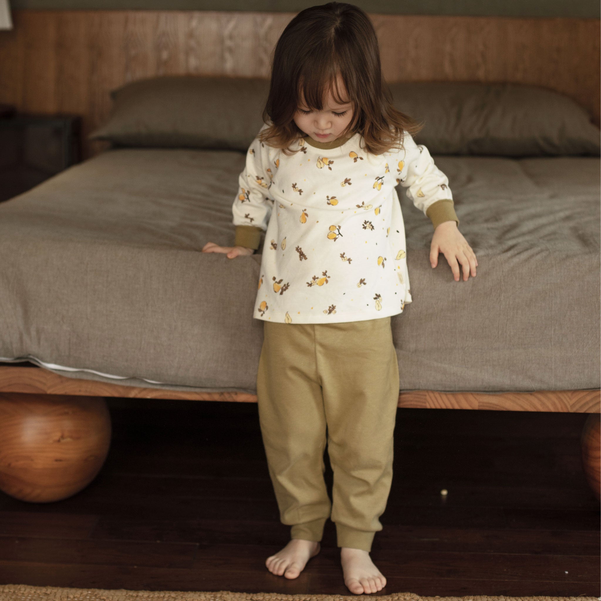 model wearing Organic Toddler Pajama Set-Pear Garden
