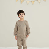 model wearing Organic Toddler Fleece Sweatpants-Winter Twig