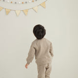 model back with Organic Toddler Fleece Sweatpants-Winter Twig