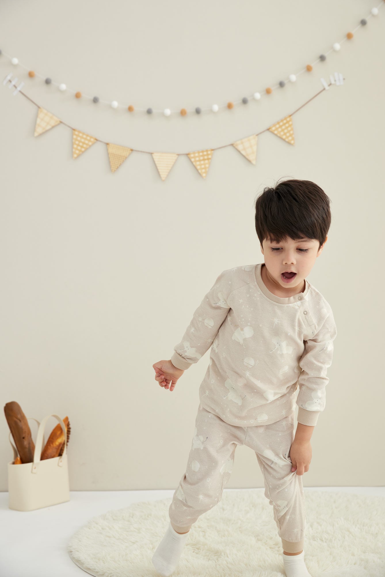 Model wearing Organic Toddler Pajama Set-Stary