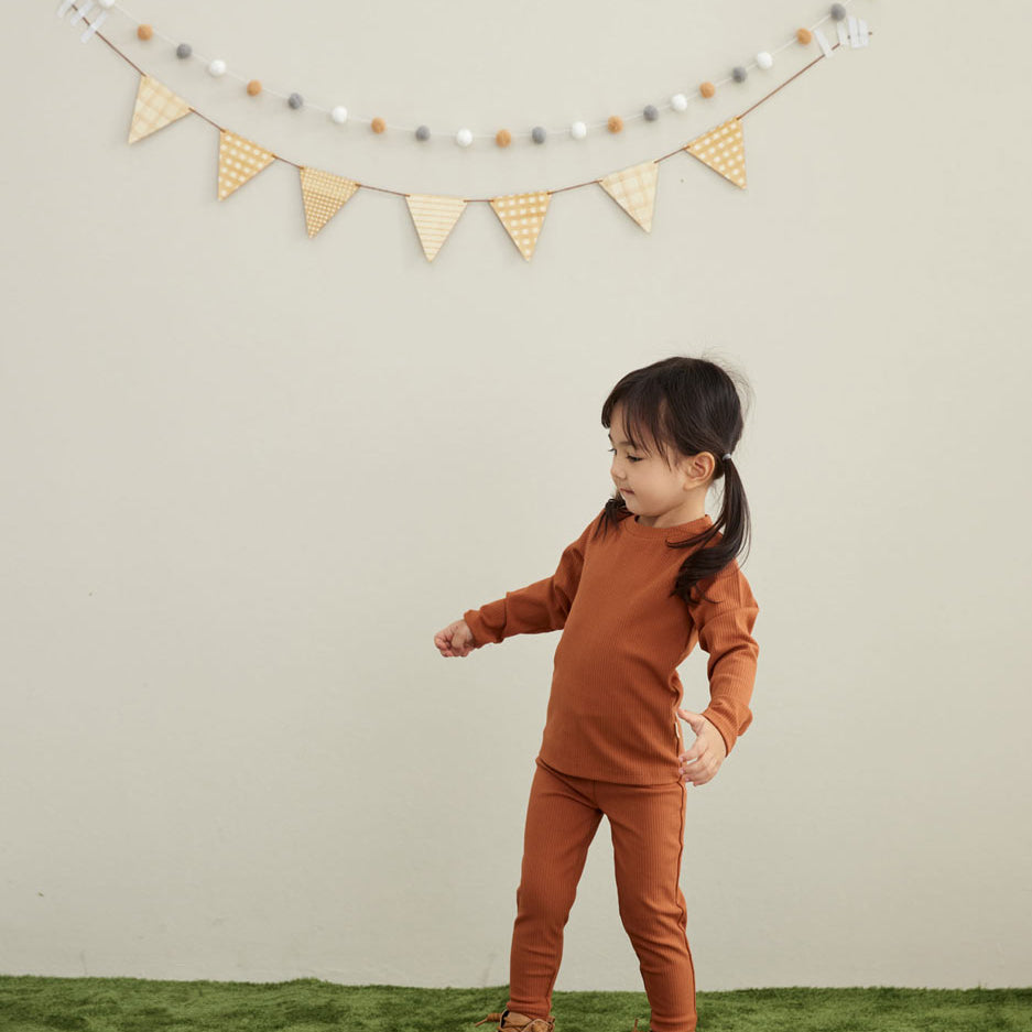 model wearing Baby&Toddler Organic Modal Basic Top-Rust