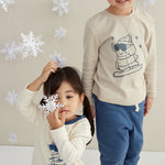 model playing snow and wearing Toddler Organic Long Sleeve Tee Shirt-Snowboarding