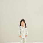 baby standing wearing Organic Toddler Pajama Set-Blueberry