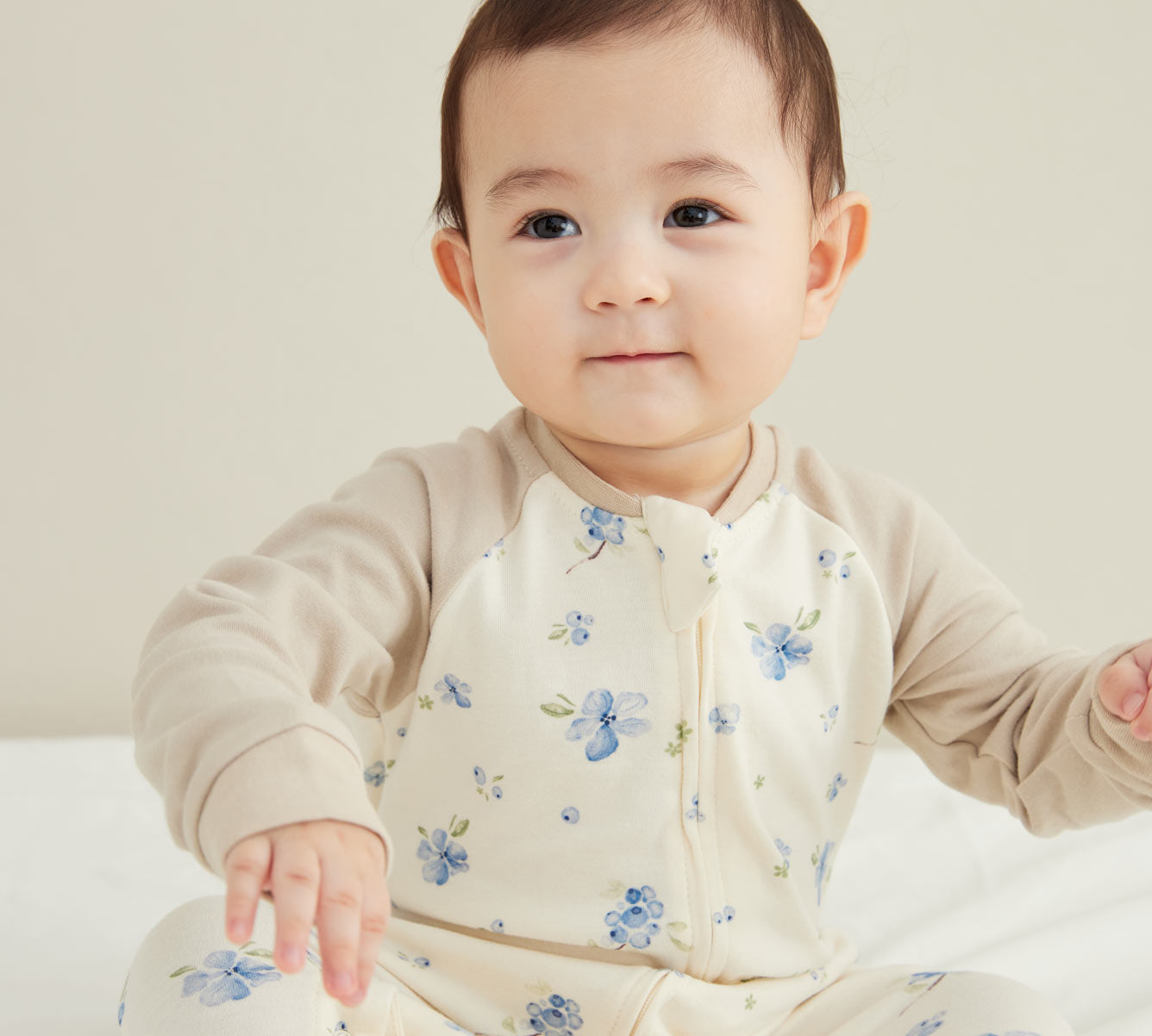 Model Wearing Baby Organic Cotton Zip-up Sleeper-Blueberry
