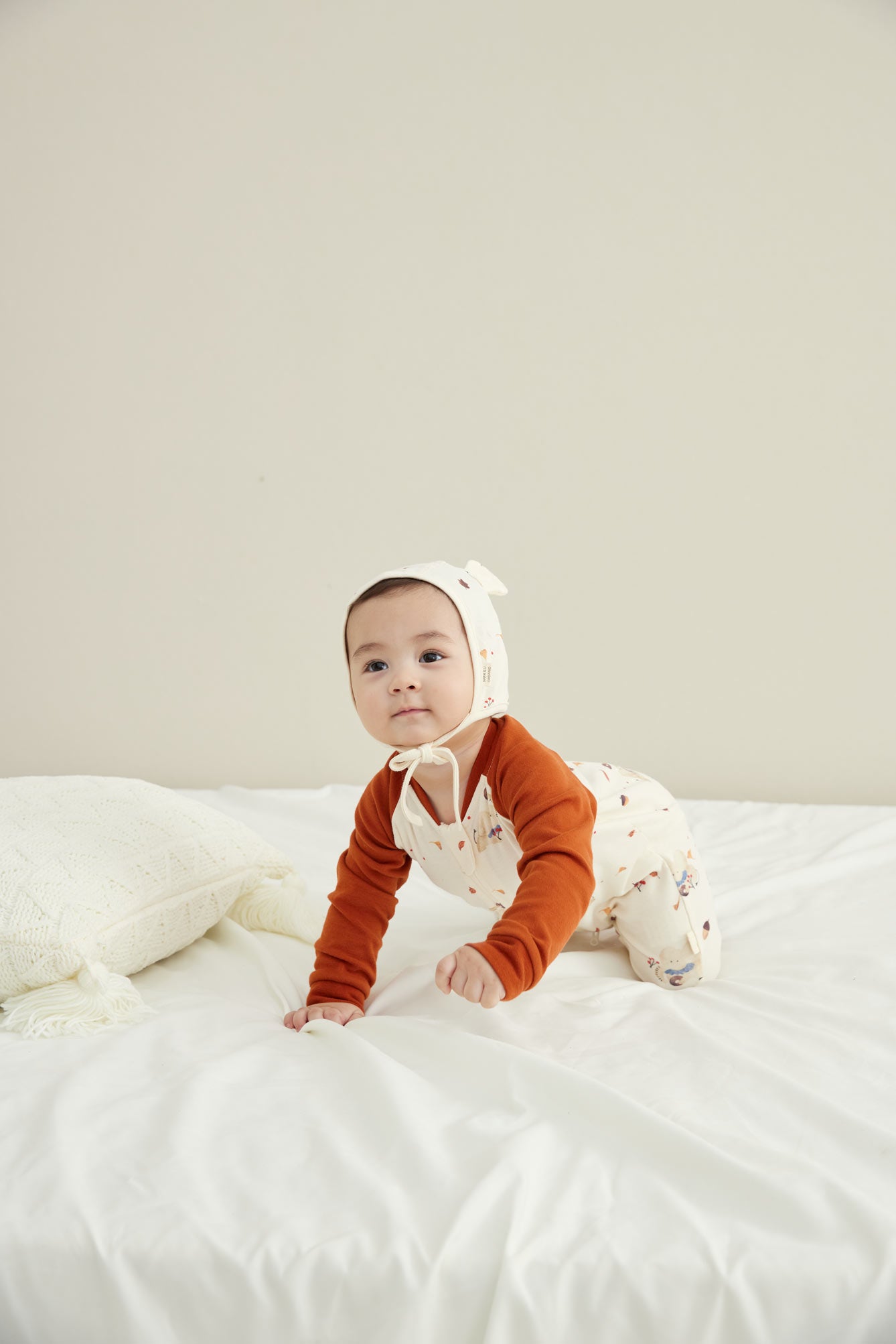 Model Wearing Baby Organic Cotton Zip-up Sleeper-Maple Leaf