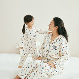 Model weraing merry dot pajama with her daughter