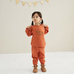 full outfit of Toddler Organic Fleece Sweatshirt-Rust