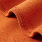 Detail of Organic Cotton Swaddle Blanket-Rust