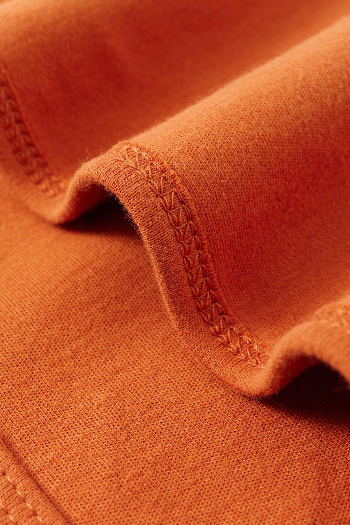 Detail of Organic Cotton Swaddle Blanket-Rust
