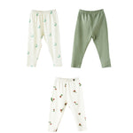 Three baby's legging on a white background