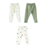 Three baby's legging on a white background