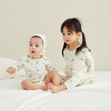 Baby and his sister in blueberry matching outfit