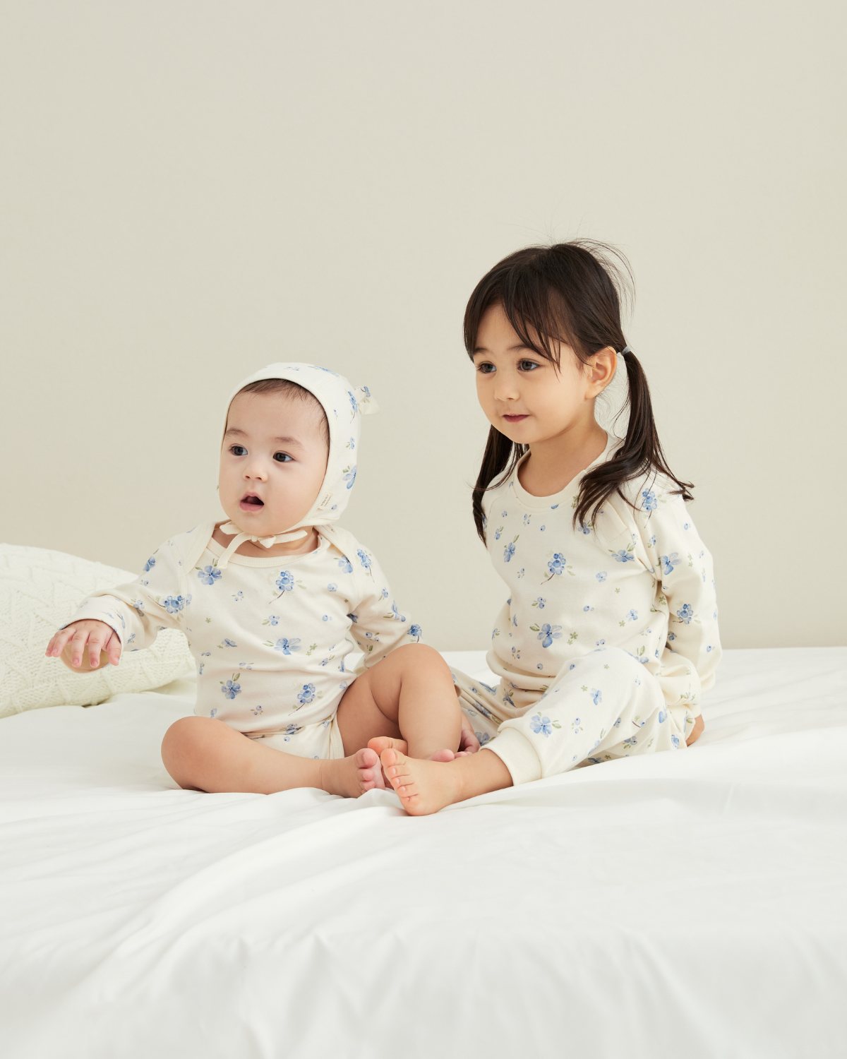 Baby and his sister in blueberry matching outfit