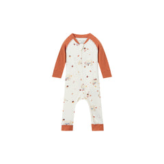A baby long-sleeve footless one-piece jumpsuit in off-white with a small woodland animal and acorn print, featuring rust-orange raglan sleeves and cuffs, shown on a plain white background.
