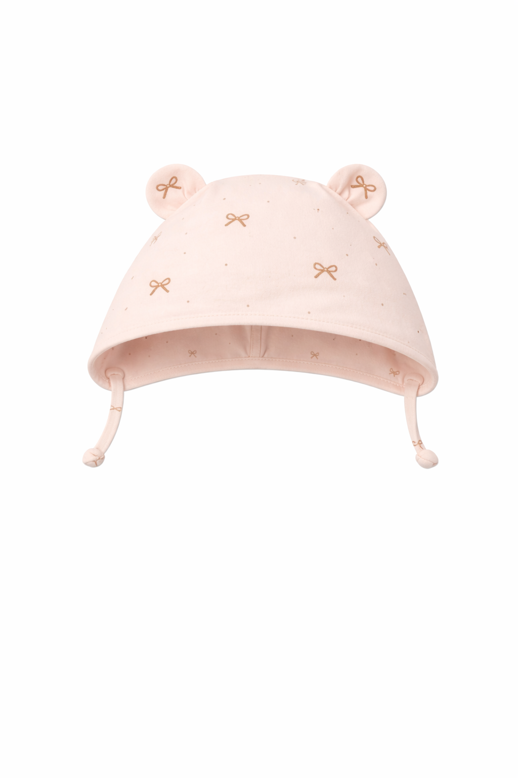 Pink baby hat with bear ears and bow details on a white background