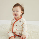 Model wearing Baby Organic Kimono Sleeper-Maple Leaf