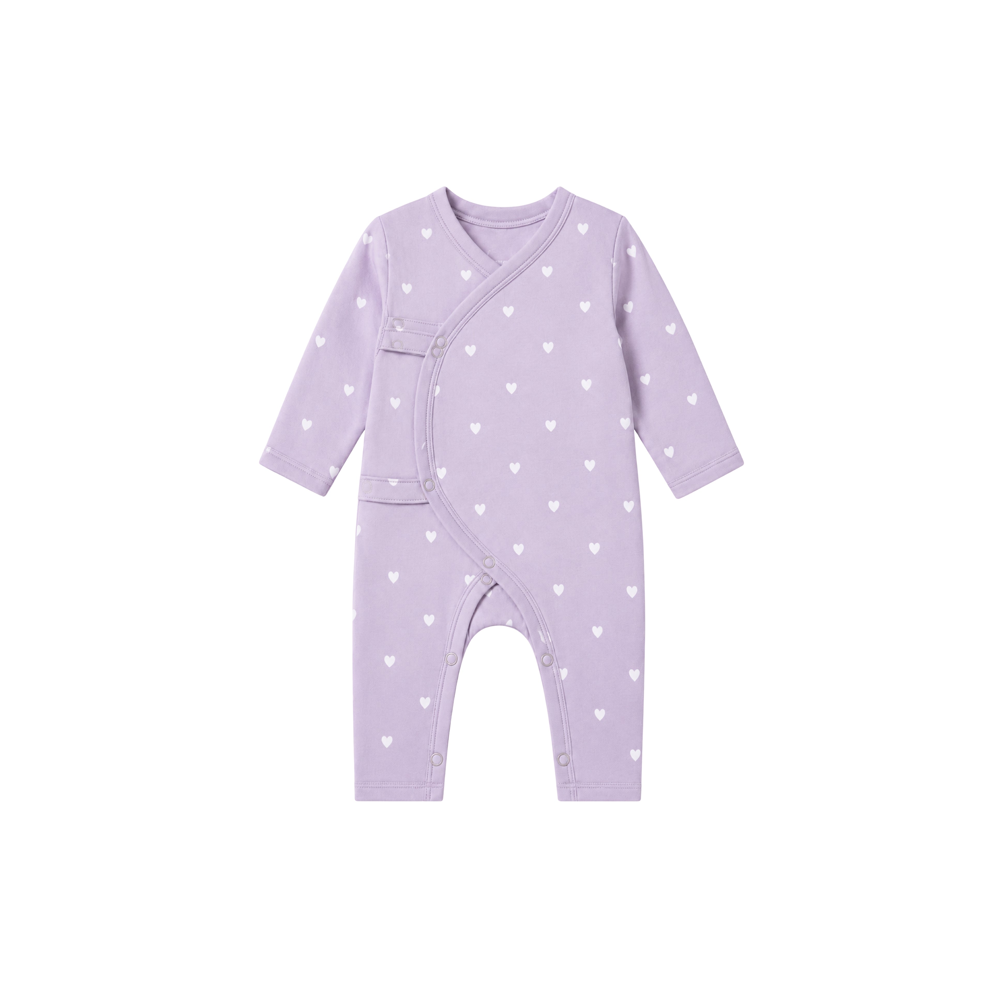 A baby long-sleeve wrap romper in light lavender purple with a pattern of small white hearts, shown flat against a solid white background.