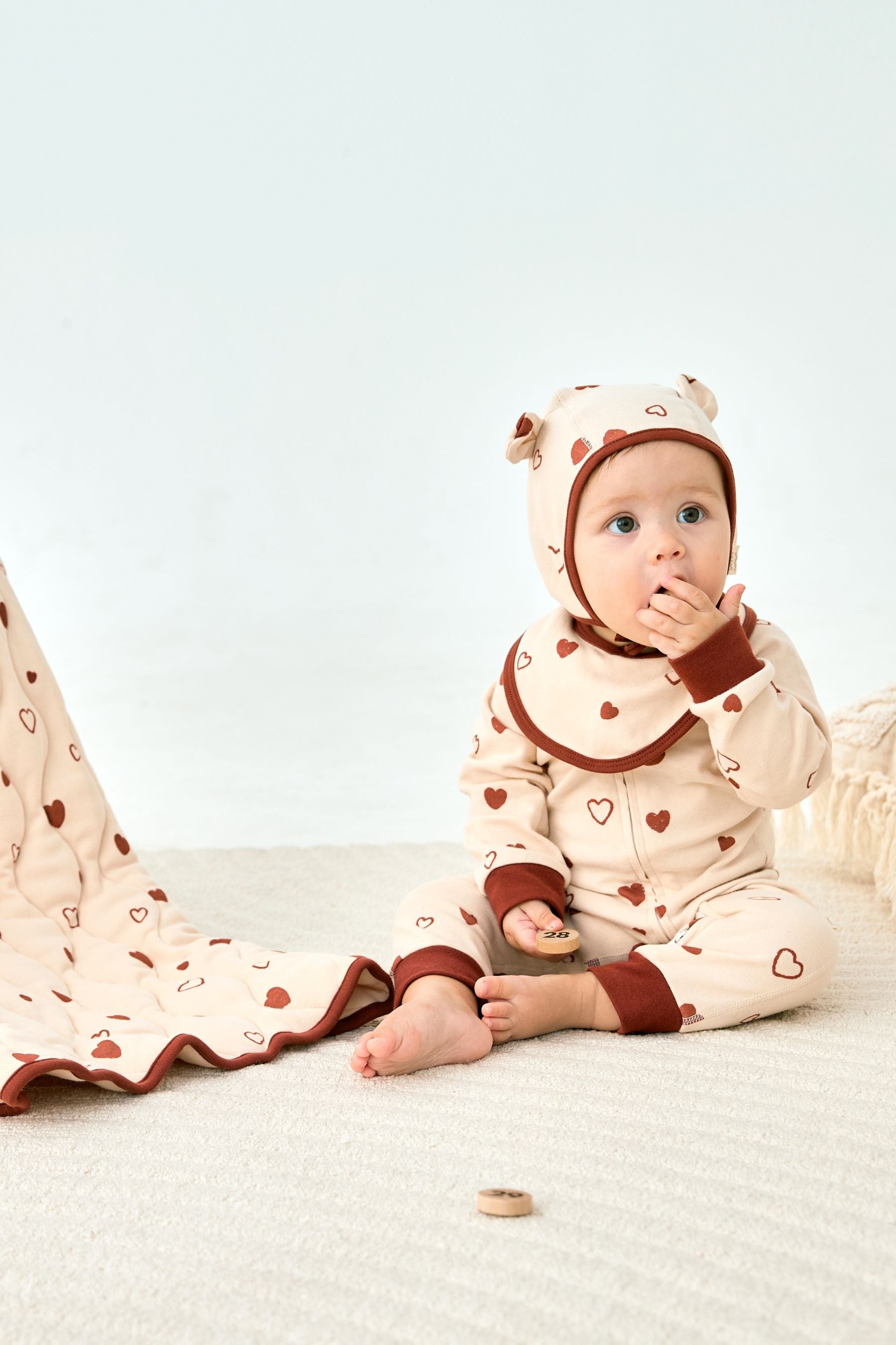 Baby girl wearing 100% organic cotton sleeper 