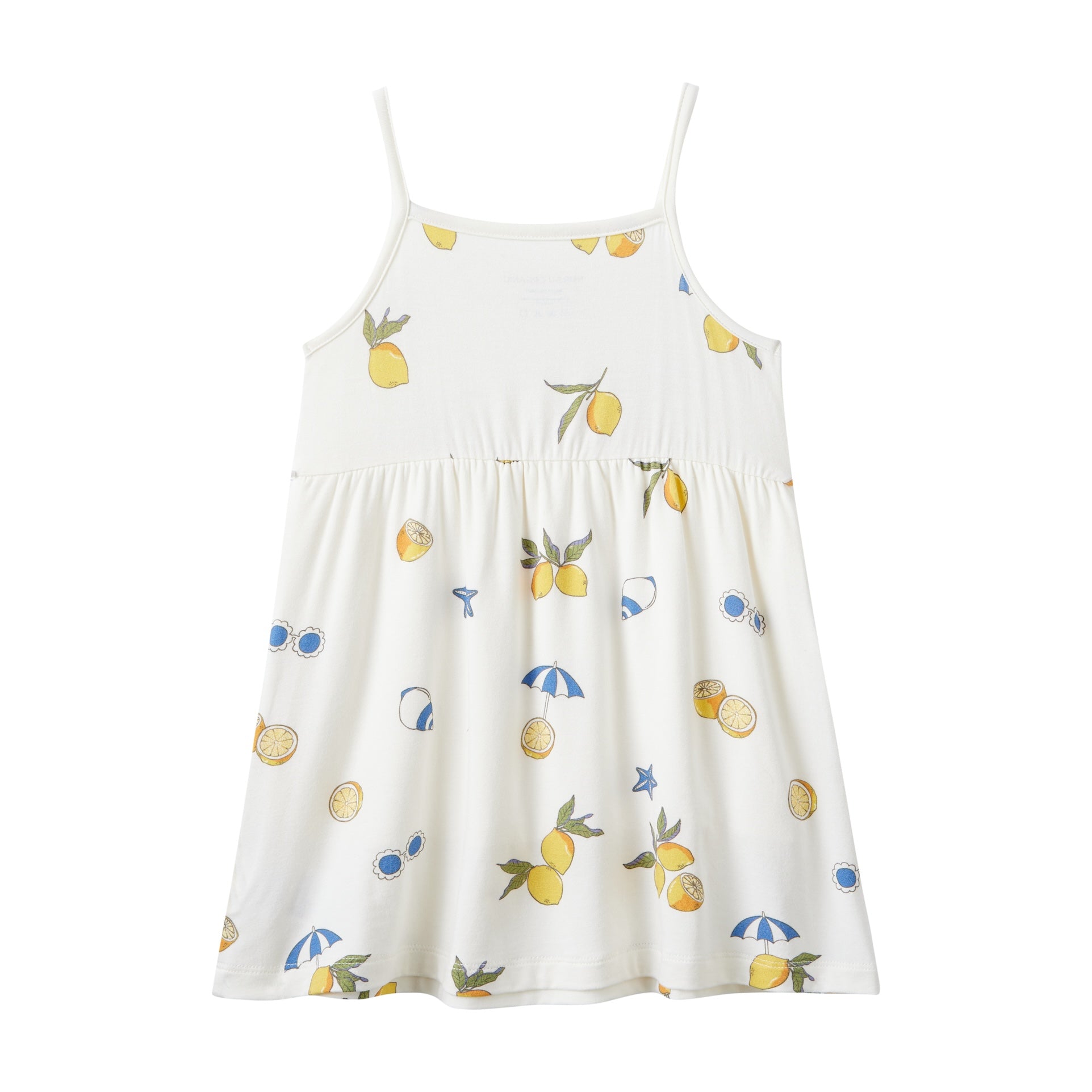 White dress with lemon print on a white background