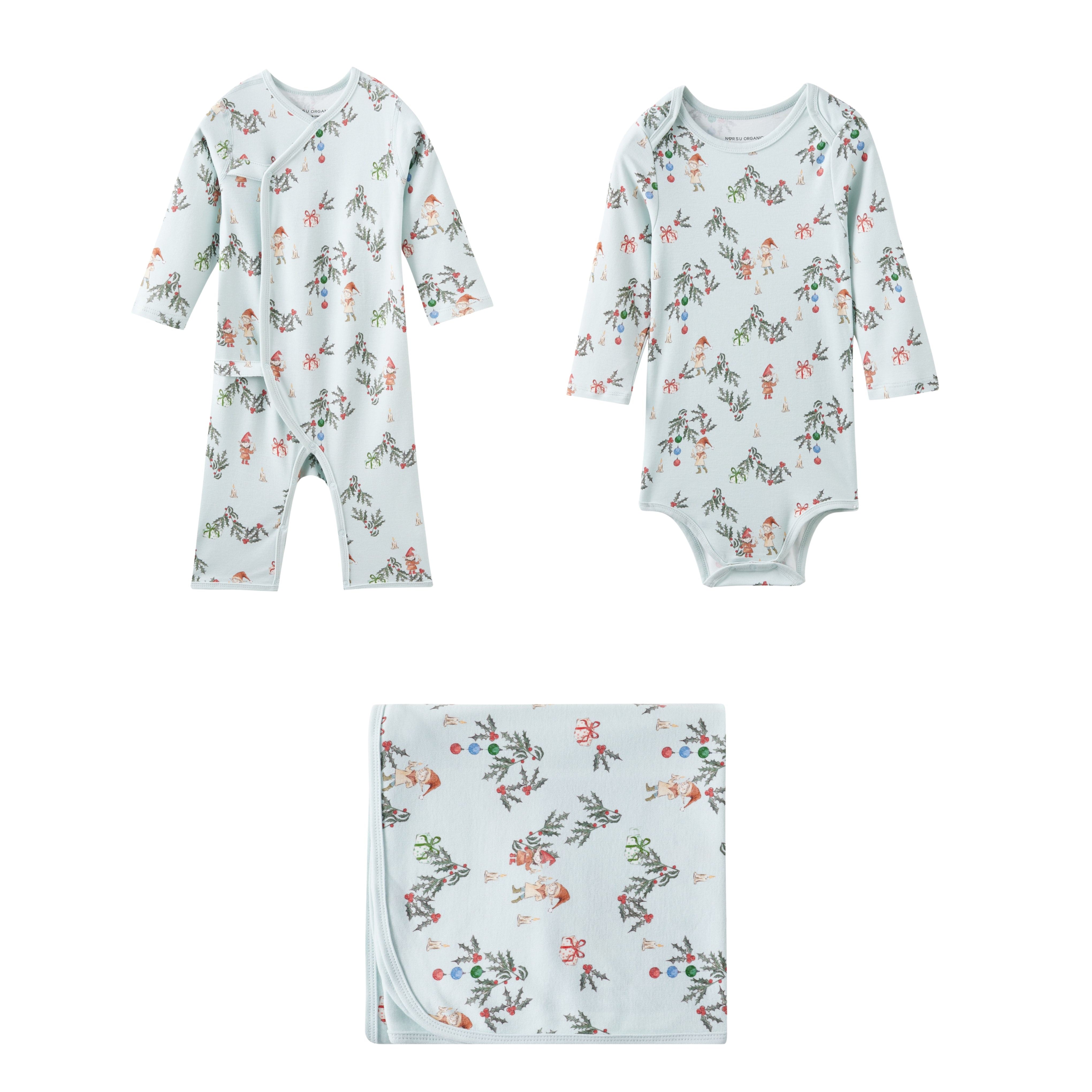 Set of baby rompers and a blanket with floral pattern on a white background