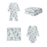 Baby clothing set with jolly patterns on a white background
