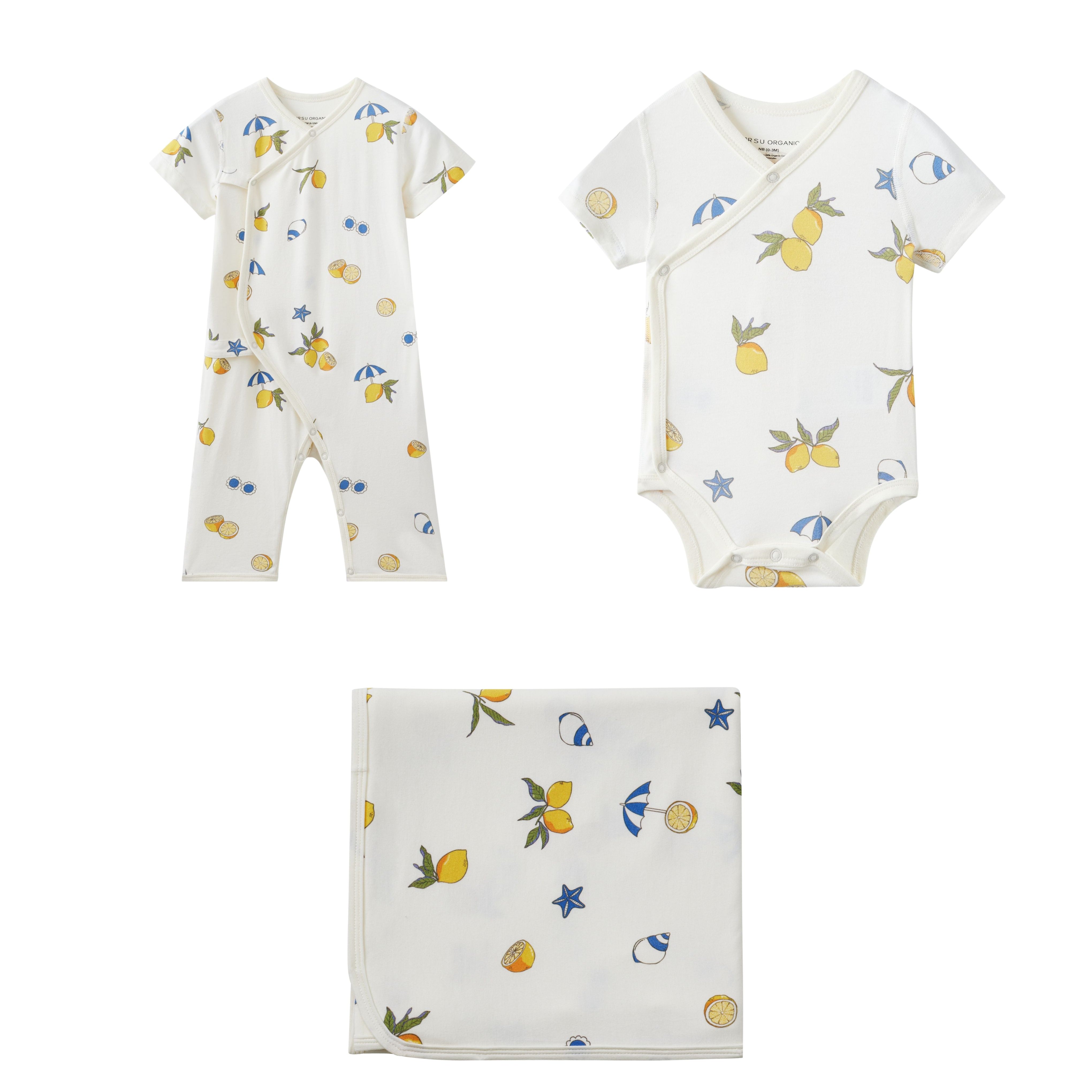 Baby clothing set with romper and onesie featuring fruit patterns on a white background