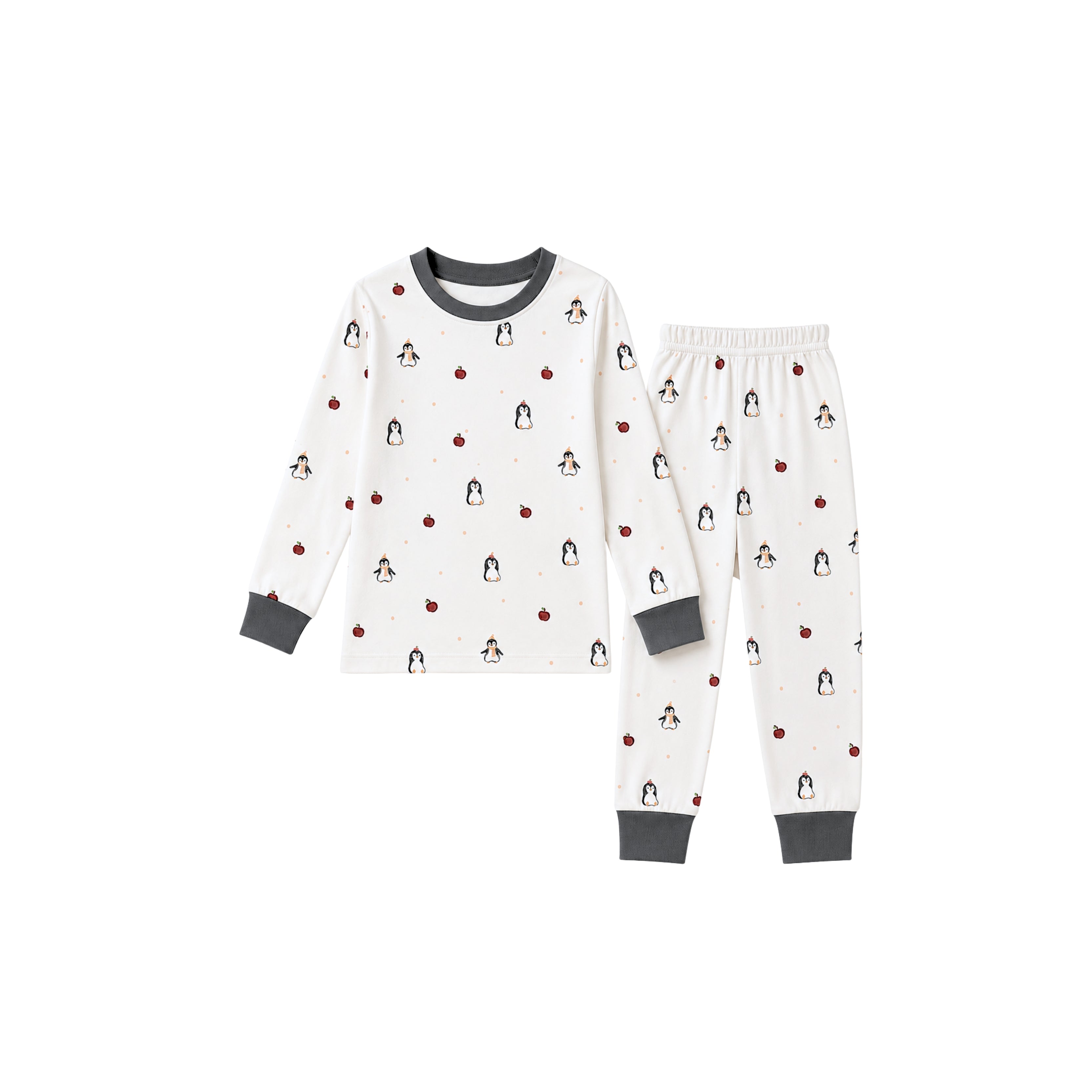 A two-piece children's pajama set featuring a long-sleeve top and matching pants. The pajamas are off-white with a repeating pattern of penguins and small red apples, finished with contrasting dark gray ribbed cuffs, collar, and hem.