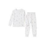 A two-piece children's pajama set featuring a long-sleeve top and matching pants in white, both printed with a delicate pink and gray pattern of tiny figures and stars.