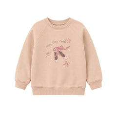 Beige sweatshirt with ballet-themed design on a white background
