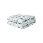 jolly-patterned quilt on a white background