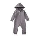 Gray baby onesie with star pattern on a white background