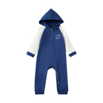 Blue and white baby onesie with a hood on a white background
