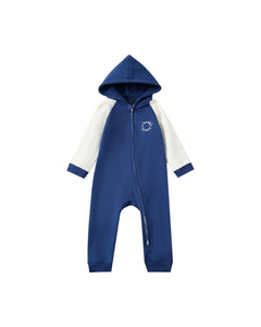 Blue and white baby onesie with a hood on a white background