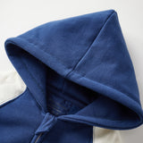 Close-up of a blue hooded garment on a white background