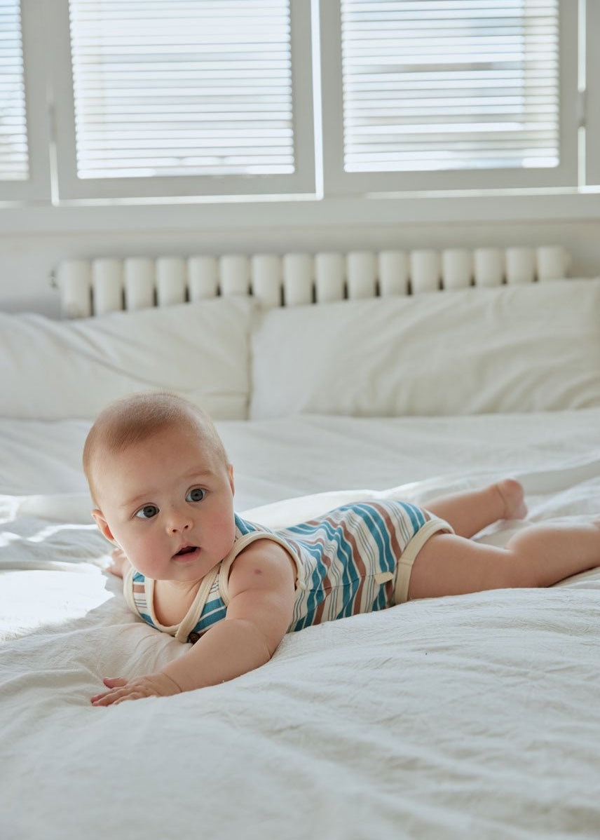 baby wearing organic bamboo onesie strip