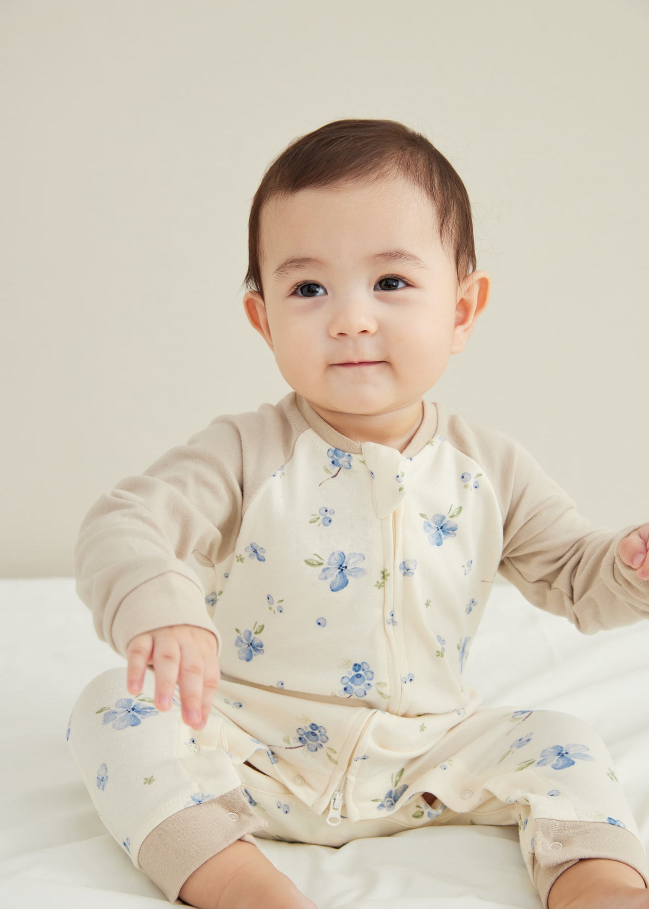 Model Wearing Baby Organic Cotton Zip-up Sleeper-Blueberry