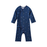 Navy blue baby sleeper with hockey pattern on a white background