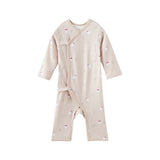 Baby onesie with polar bear pattern on a white background