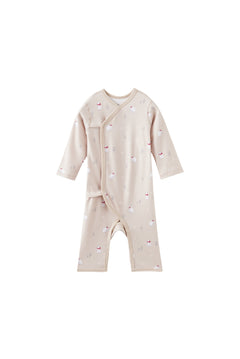 Baby onesie with polar bear pattern on a white background