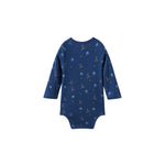 Navy blue baby onesie with pattern on a white background