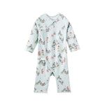 Baby sleeper with tree print on a white background