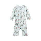 Baby sleeper with tree print on a white background