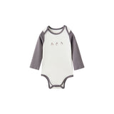 White baby onesie with gray sleeves on a white background
