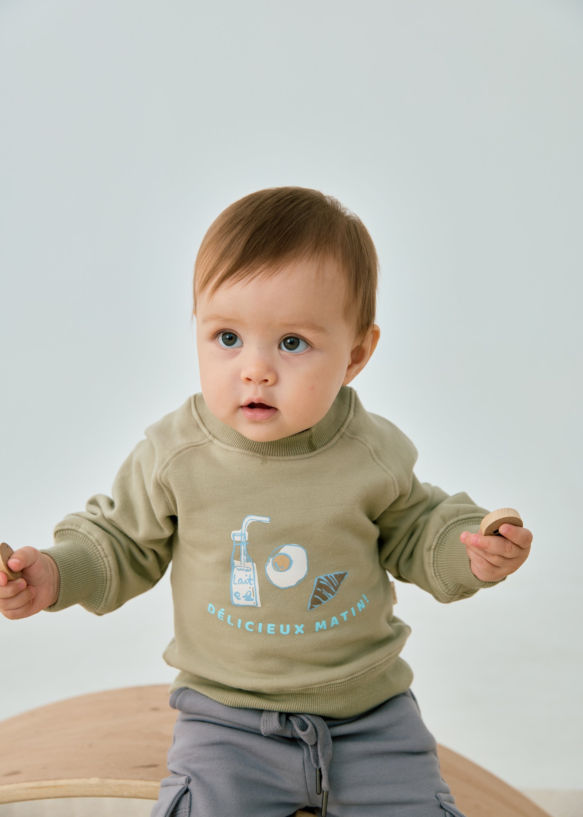 baby wearing Toddler Organic Fleece Sweatshirt-Milky