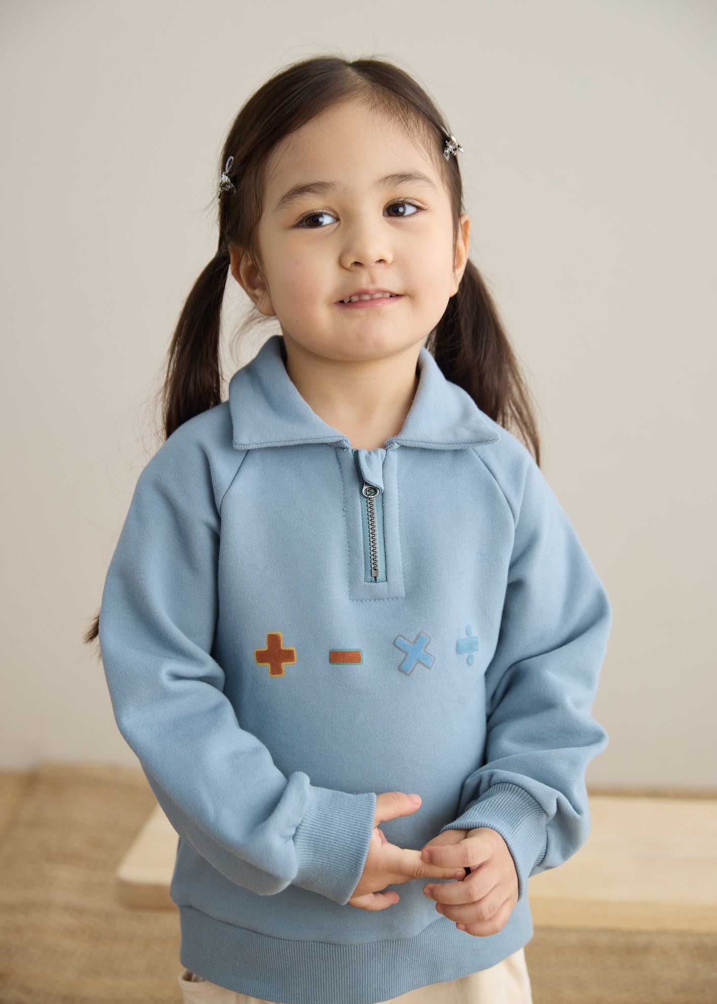 closer look of Toddler Organic Fleece Zip-up Sweatshirt-Symbols