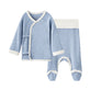 Baby blue outfit with white trim on a white background