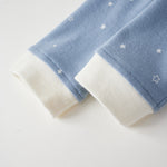 sleeve with white stars on a light gray background